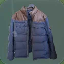 A navy puffer jacket with brown leather shoulders